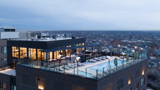 Rooftop pool with city and mountain views