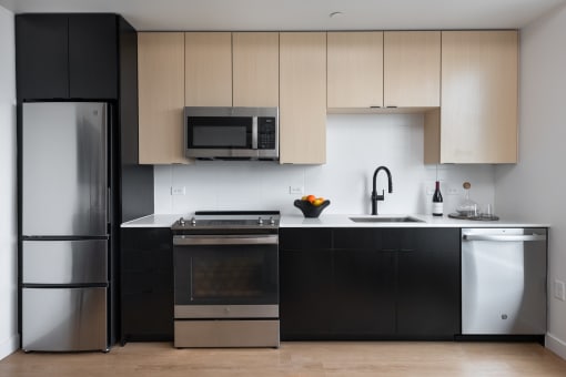 Model kitchen with black matte finishes and view