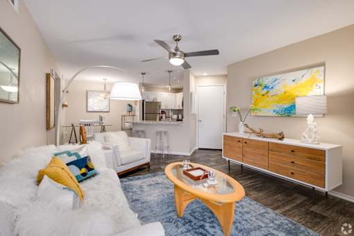 Open concept living space with kitchen view at Fusion Apartments, Florida