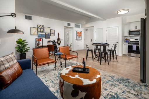 Living room with couch at Aston at Gateway Apartments, El Monte