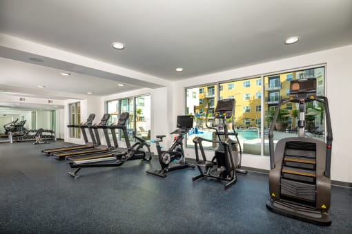 Fitness center at Aston at Gateway Apartments, El Monte, CA