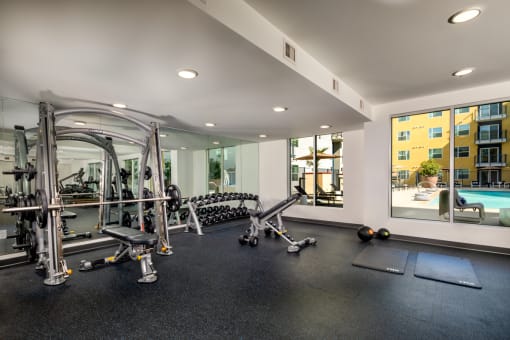 Gym area at Aston at Gateway Apartments, El Monte, 91731
