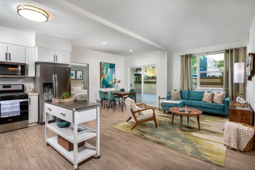 Living and dining at Aston at Gateway Apartments, El Monte, CA