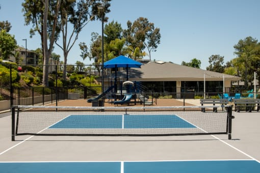 a tennis courts and playground