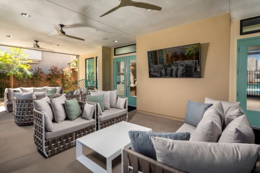 a living room with couches and a coffee table