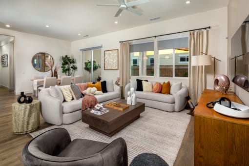 a living room with couches and a coffee table