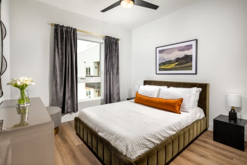 a bedroom with a bed and a window at VORA LUX, San Diego, CA