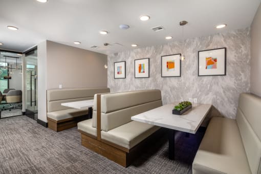 a seating area with couches and a table at VORA LUX, California, 92120