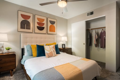 a bedroom with a bed and two night stands at Odyssey Ridge, Albuquerque, NM, 87114