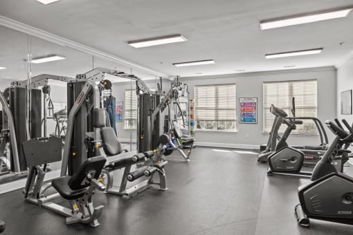 the gym at the district flats apartments in lenexa