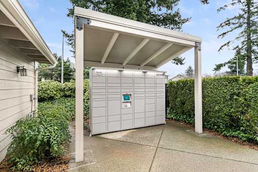 A utility box is covered by a white canopy.