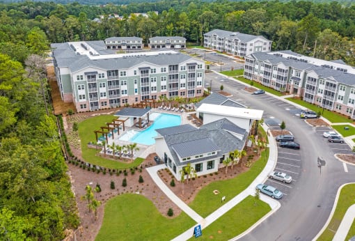 an aerial view of the resort with a swimming pool