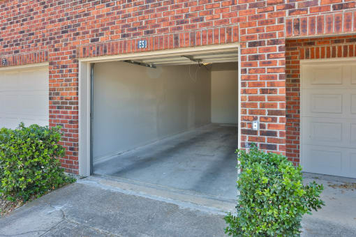 an empty garage in a brick building at The Quarry Alamo Heights, San Antonio, 78209