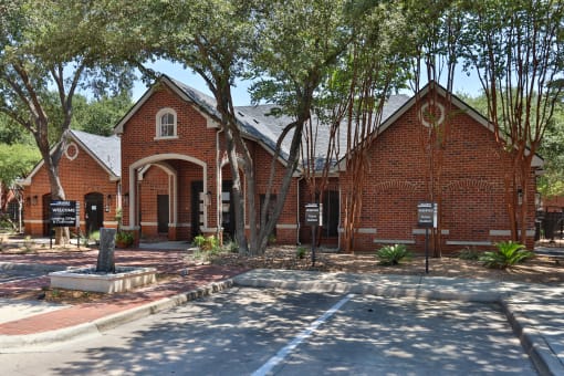 a church with a sign in front of it at The Quarry Alamo Heights, San Antonio, 78209