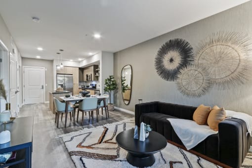 Living room and dining room with a kitchen in the background at Array La Mesa, La Mesa, 91942