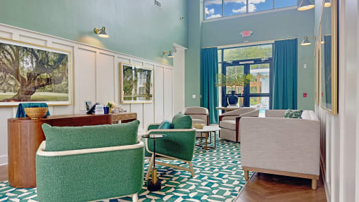a living room with green chairs and a blue and white rug