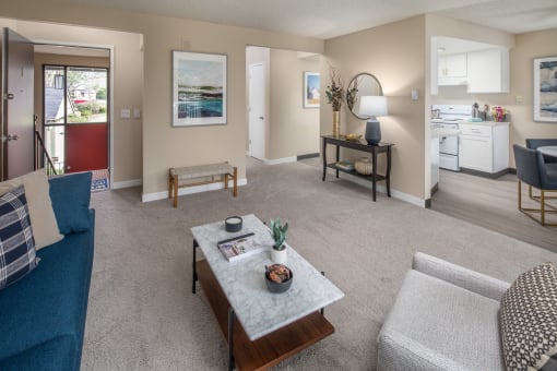 Living room with a couch and a table at Summerfield, Tigard, OR, 97224
