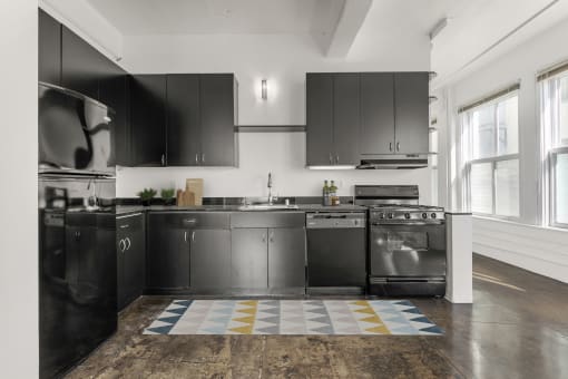 Kitchen with stainless steel appliances at San Fernando Building, CA, 90013
