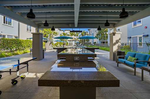 A public park with a fountain and benches.