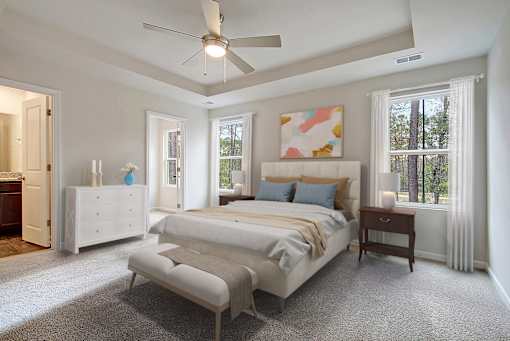 Primary bedroom with attached closet and bathroom