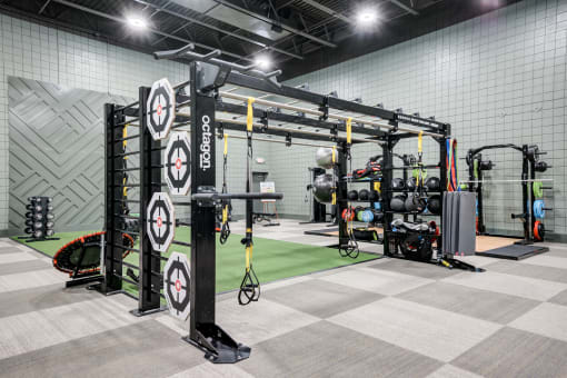 a gym with weights machines and other gym equipment
