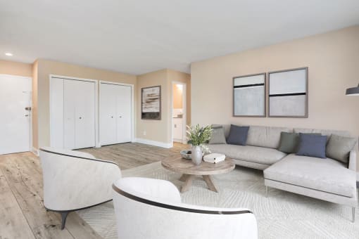 Living room with white couch at Shawnee Apartments, Arlington, 22204