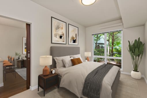 a bedroom with a large window and a large bed at Allez, Redmond, WA 98052