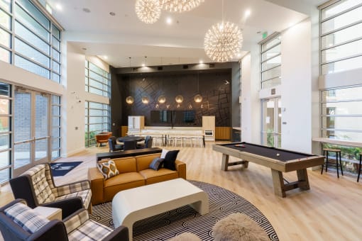 the preserve at gateway living room with billiards table
