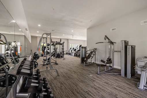 A Gym With Cardio Machines at Odyssey Apartments, Albuquerque, 87114