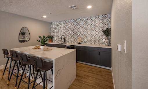 A Kitchen With a Marble Countertop at Odyssey Apartments, New Mexico, 87114