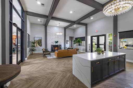 A Large Living Room With Fireplace at Odyssey Apartments, Albuquerque, New Mexico