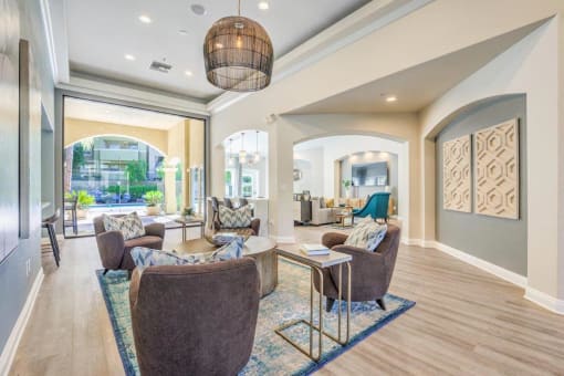 Clubhouse with couch  at Stone Canyon Apartments, Riverside, California