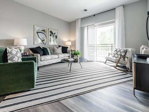 Living room 1 at Velo Village Apartments, Wisconsin