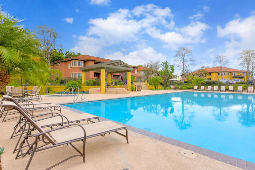 Swimming Pool with Lounge Chairs, at Sunbow Villas, Chula Vista, CA