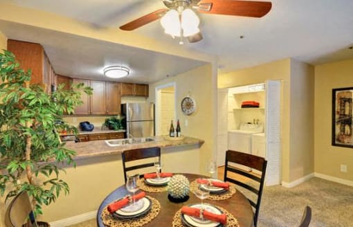 Model Apartment dining and kitchen at Rising Glen, Carlsbad, 92008