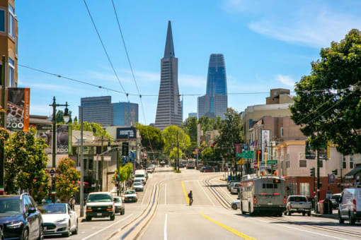 a city street with a view of the transamerica pyramid