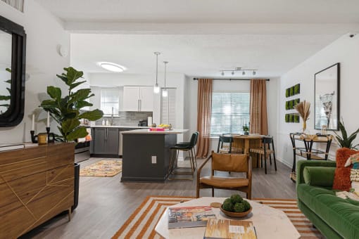 an open floor plan with a kitchen and living room