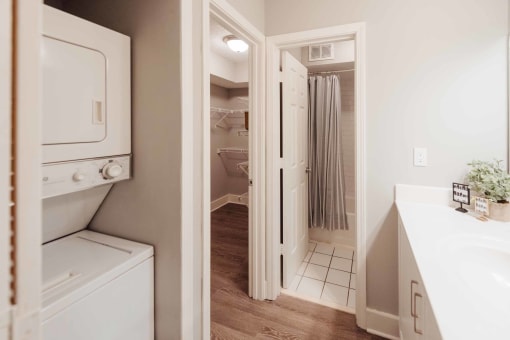 a bathroom with a washer and dryer