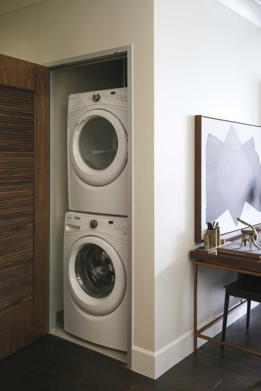 a washing machine and dryer in a laundry room