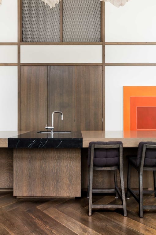 a kitchen with a wooden counter top and a sink