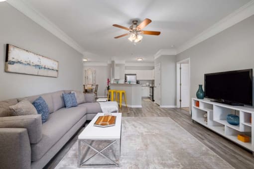 a living room with a couch and a table