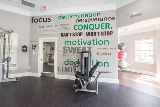 a gym with a wall with words on it