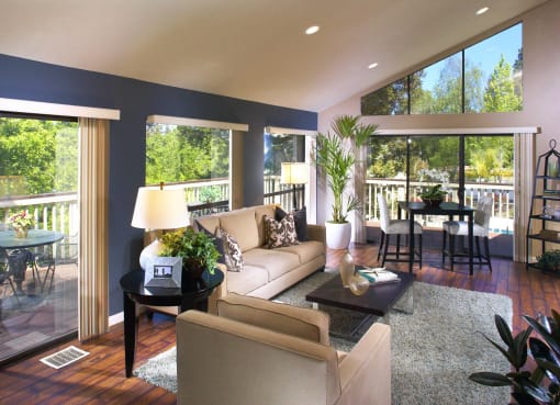 a living room with a couch and a table
