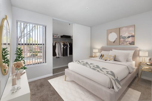 a bedroom with a large bed and a window