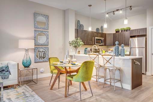 Living room and kitchen at Incline at Anthem senior apartments in Herriman