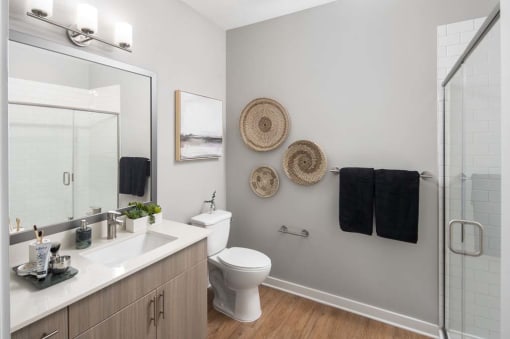 Bathroom with mirror and sink at Alta Davis, Durham, North Carolina