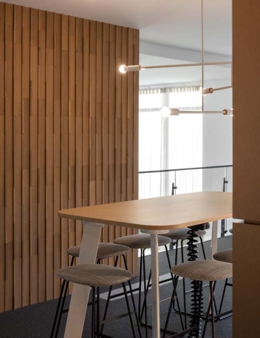 Dining room with wooden table at Alta Davis, Durham, 27703