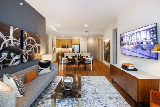 a living room with a couch and a table