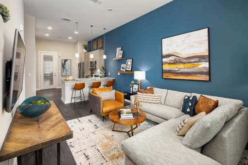a living room with a couch and a table