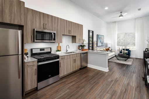 a kitchen with a stove and a refrigerator